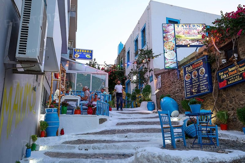 Riga Fereou, Steps of Kos, famous alley, Cosy alleyway with lively tavernas and colourful decoration under the Mediterranean sun, Kos Town, Kos, Dodecanese, Greek Islands, Greece