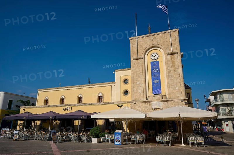Cinema, Eleftherias Square, building with clock tower and terrace café under a clear sky, Kos Town, Kos, Dodecanese, Greek Islands, Greece