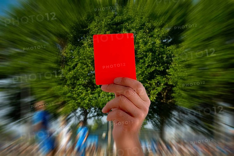 (Photomontage) Red card at a football match