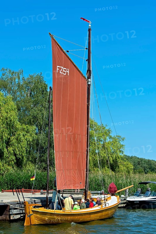 Zeesenboot casting off in Krummin natural harbour, Usedom Island, Mecklenburg-Western Pomerania, Germany