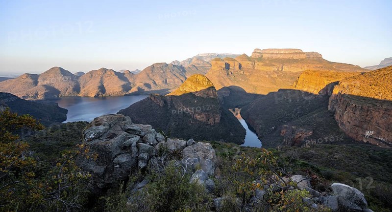 Sunset at Blyde River Canyon with Three Rondawels peak, view of canyon with Blyde River and table mountains in the evening light, canyon landscape, Panorama Route, Mpumalanga, South Africa