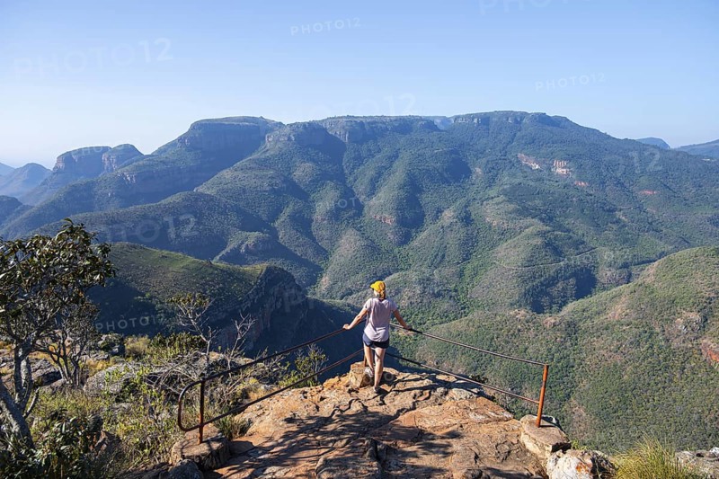 Tourist at the viewpoint, view of the Blyde River gorge, Lowveld Viewpoint, in the evening light, canyon landscape, Blyde River Canyon, Panorama Route, Mpumalanga, South Africa