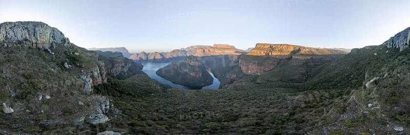 Sunset at Blyde River Canyon with Three Rondawels peak, view of canyon with Blyde River and table mountains in the evening light, canyon landscape, Panorama Route, Mpumalanga, South Africa