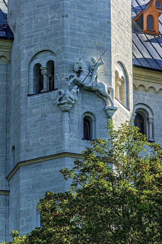 Sculpture of Sigurd the Dragon Slayer on the stair tower, Neuschwanstein Castle by King Ludwig II, fairytale castle in Neo-Romanesque style, UNESCO World Heritage Site, Schwangau, Königswinkel, Allgäu, Swabia, Bavaria, Germany