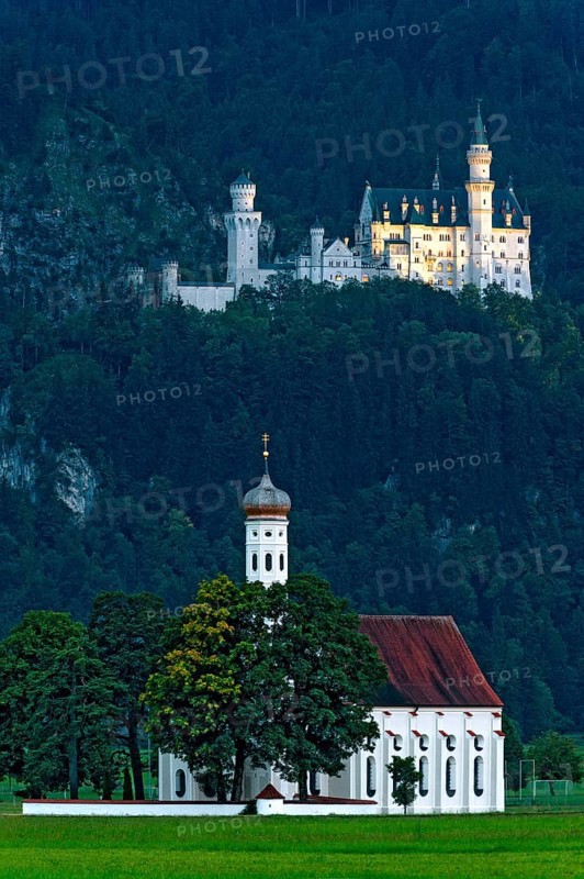 Pilgrimage church of St Coloman, Baroque, Neuschwanstein Castle by King Ludwig II, fairytale castle in the Neo-Romanesque style, UNESCO World Heritage Site, illumination at the blue hour, Schwangau, Füssen, Allgäu, Swabia, Bavaria, Germany