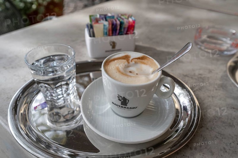 Cappuccino served with a glass of water, Bressanone, Italy