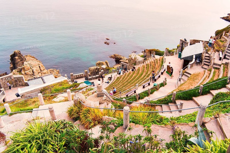 Minack Theatre, spectacular open-air theatre, circular path with lush planting, South England coast, Cornwall, England, GB