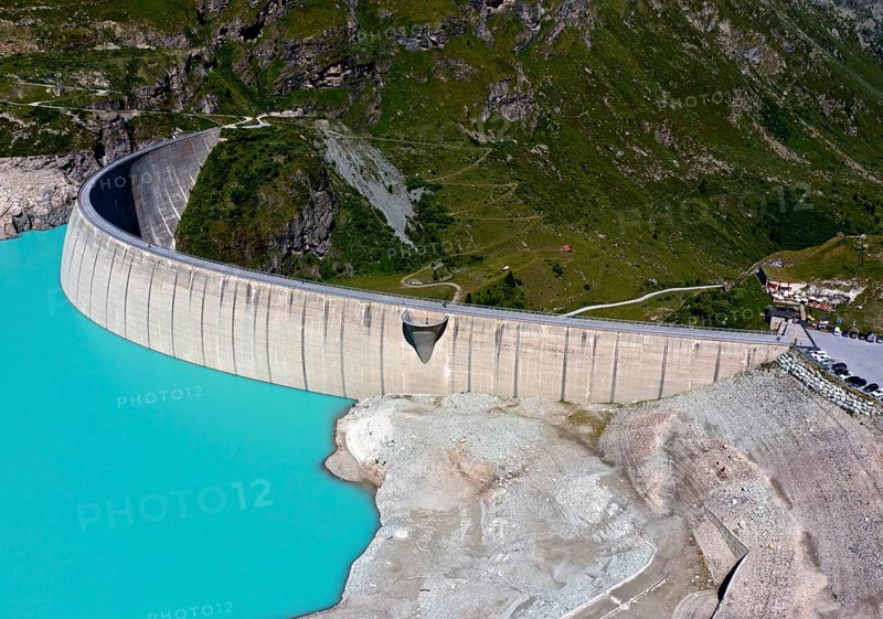 Impressive arch dam of the Moiry reservoir, Lac de Moiry, at low water in summer, Val d'Anniviers, Valais, Switzerland