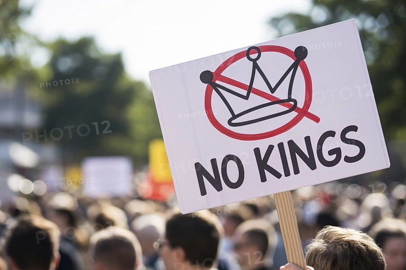 Protest sign with text No kings and crossed-out crown. Demonstration in progress. Generative AI, AI generated