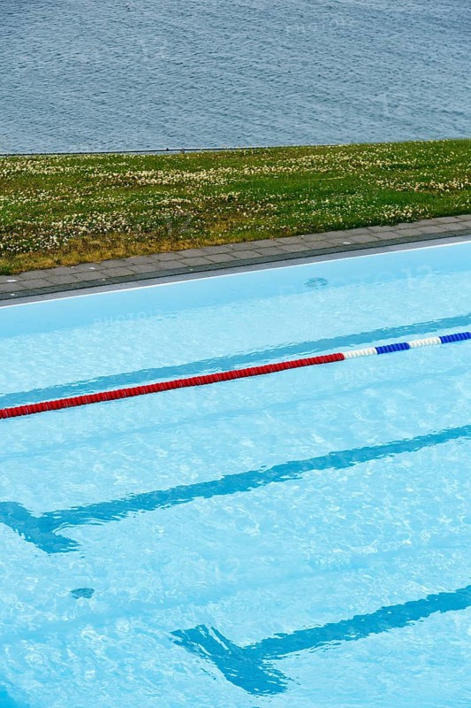 View from above of swimming pool by the sea, lane divider, lane rope in outdoor pool, Hofsos, Tröllaskagi peninsula, Nordurland vestra, North Iceland, Iceland