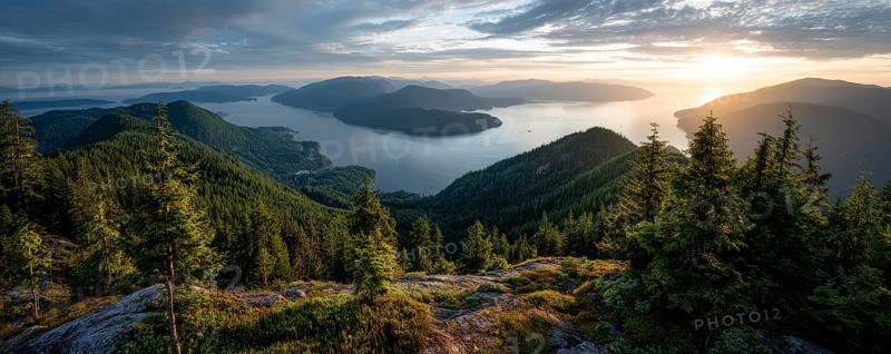 Beautiful Panoramic View of Canadian Nature Landscape from the top of the Mountain during a sunny summer sunset, AI generated