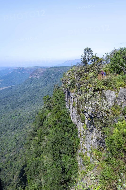 Tourist on a viewing platform at the canyon, view at God's Window, canyon landscape, near Graskop, Mpumalanga, South Africa