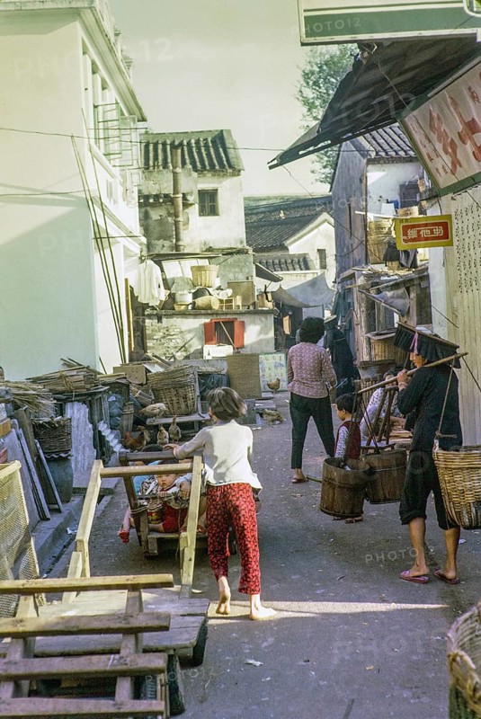 Activity in back alley street, Sai Kung, New Territories, Hong Kong, Asia 1965