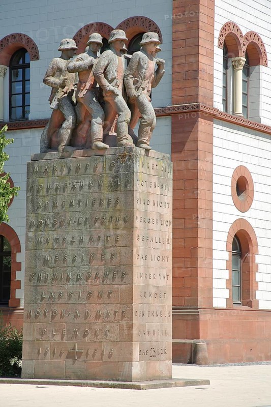 War memorial with four soldier figures and inscription, sculptures, text, Fruchthalle, Kaiserslautern, Rhineland-Palatinate, Germany