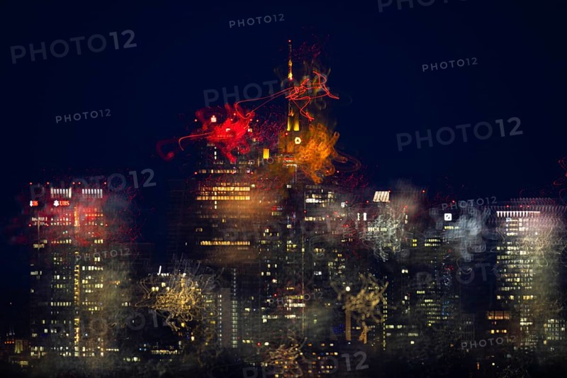 The lights of Frankfurt's banking skyline glow in the night. (long exposure), Frankfurt, Hesse, Germany