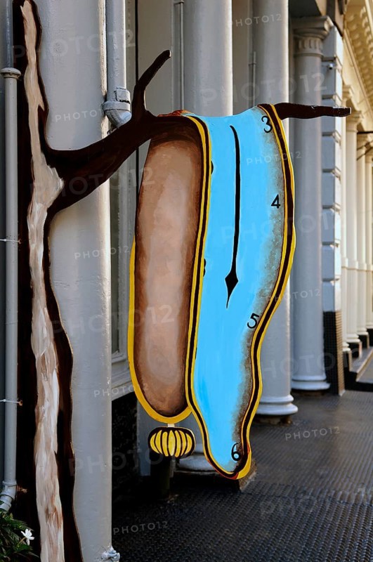 Entrance sign of an art gallery with a Salvadore Dali motif in downtown, New York City, USA
