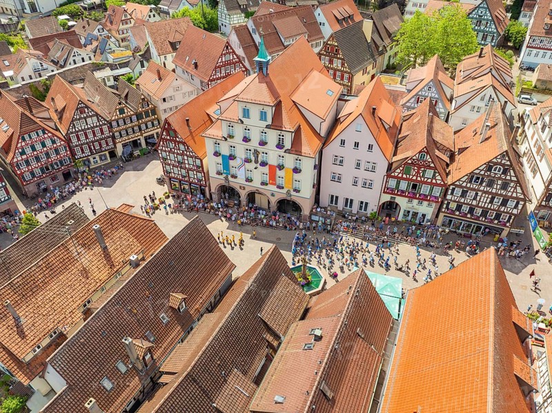 People on a square surrounded by half-timbered houses at a festival, summer day, 950 years Calw, parade Calw, Black Forest, Germany