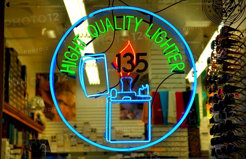 Illuminated advertising in a lighter shop, New York City, USA