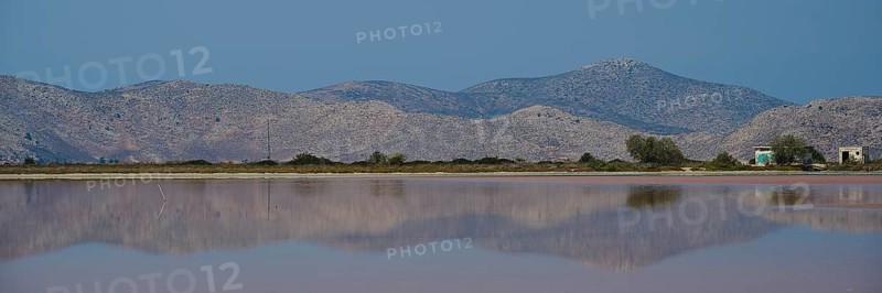 Clear mountains with a calm lake in the foreground, soft reflections and blue sky, salt lake, Tigaki, nature reserve, hydro biotope, Kos, Dodecanese, Greek Islands, Greece