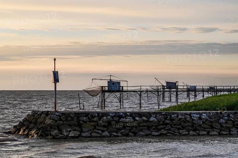 Sunset over Fishing huts over Randonnee entre Histoire et Nature, Fouras, Fouras-les-Bains, Charente-Maritime, Nouvelle-Aquitaine, France
