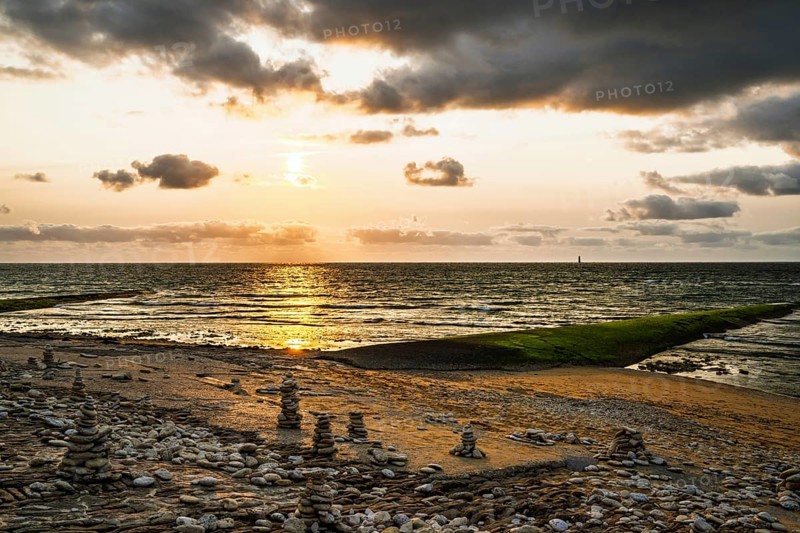 Sunset over beach of WHALE LIGHTHOUSE, Saint-Clement-des-Baleines, Atlantic, France