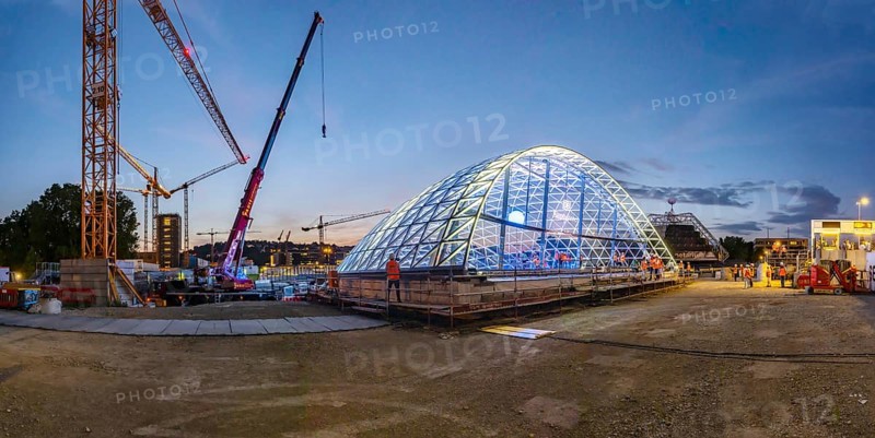 First entrance portal at the new Stuttgart main station completed. One of four so-called lattice shells, which travellers will use to access the underground through station in future, is revealed for the first time. The spectacular steel and glass construction was realised by façade specialist Seele and planned by christoph ingenhoven architects. Stuttgart, Baden-Württemberg, Germany