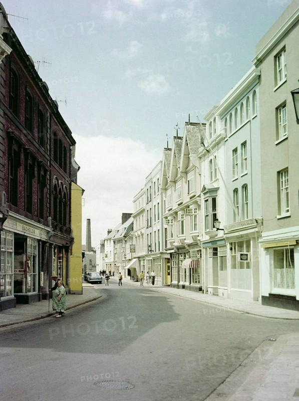 Historic Southside Street, Maritime Inn pub view to chimneys of gin distillery, Barbican, Plymouth, Devon, England, UK, c 1960
