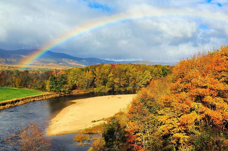 Scenic river landscape with rainbow, Saco River in Mount Washington Valley, colorful fall leaves, Indian summer, sunny weather, Conway, Kancamagus Highway, White Mountain, New Hampshire, New England, USA