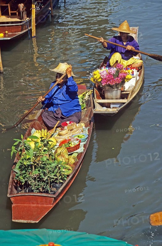 Merchants in their boats at Damnoen Saduak Floating Market, Thailand, December 2002, vintage, retro, old, historic