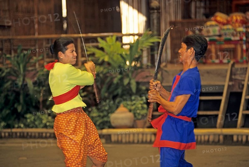 Performance of a traditional sword fight in the Rose Garden near Bangkok, Thailand, December 2002, vintage, retro, old, historic