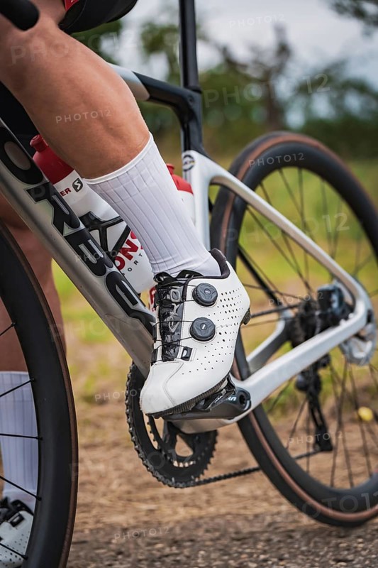Detail of a cyclist focusing on shoes and pedals while riding, triathlon, Calw, Germany