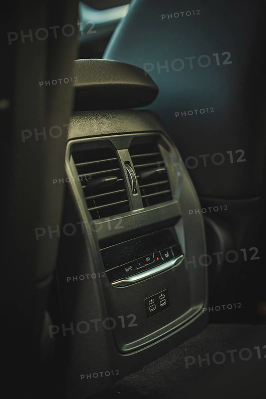 Ventilation grille in the interior of a car in dark colors, BMW i7 electric car, Deer e-Carsharing, Calw, Germany
