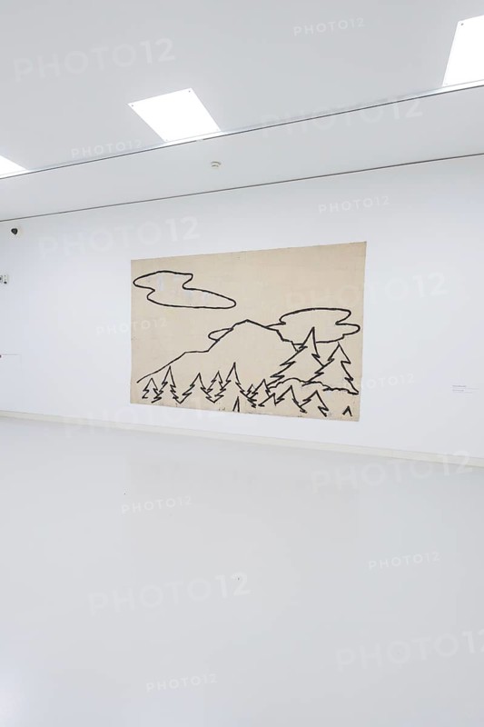 A simple work of art with a mountain motif hangs in a gallery wall, Schauwerk, Sindelfingen, Germany