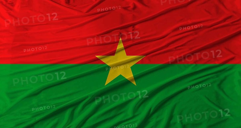 Burkina Faso flag waving. Flag of Burkina Faso with cloth texture