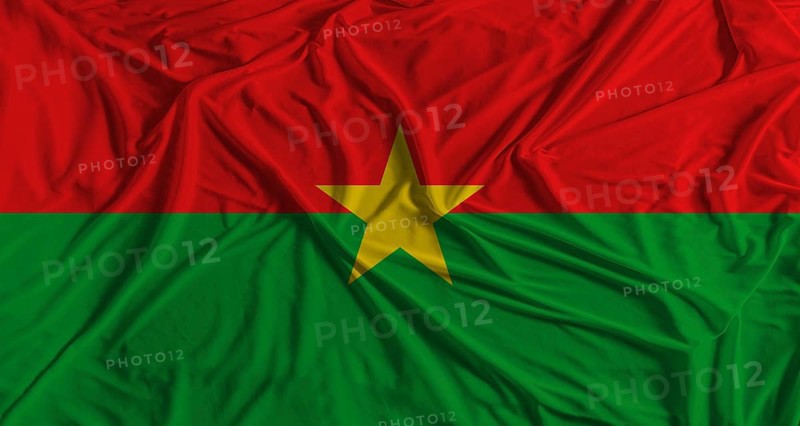 Burkina Faso flag with fabric texture background. National flag of Burkina Faso with cloth texture
