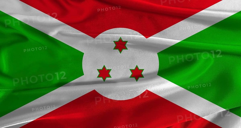 Flag of Burundi with fabric textured background. Close up of National flag of Burundi with realistic texture