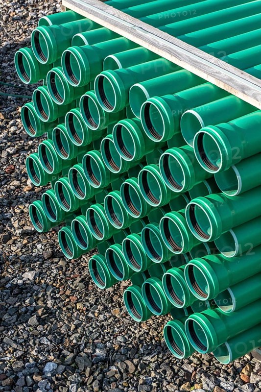 Symbolic picture construction site, sewage pipes for dirty and rainwater, for installation in the ground, plastic pipes, made of polypropylene, storage on a construction site