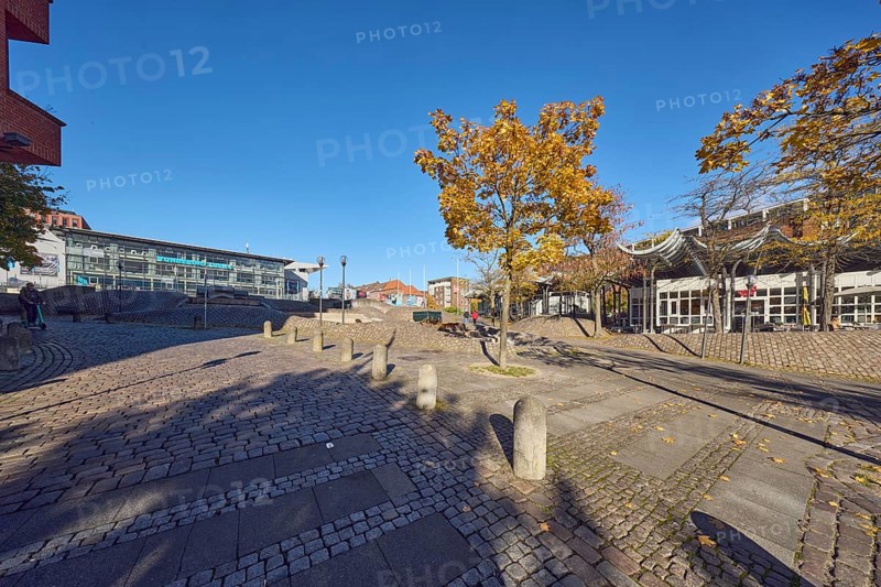 Pedestrian zone, lantern, barrier bollard, trees, autumn leaves, multi-purpose hall Wunderino Arena or former Baltic Sea Hall, blue sky, cloudless, squirt, Europaplatz, Kiel, state capital, district-free city, Schleswig-Holstein, Germany