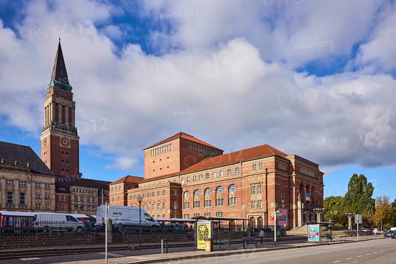 Opera house, architect Christian Heinrich Seeling, art nouveau style, historic brick building, brick architecture, town hall tower, bus stop Rathaus - Opernplatz, trees, blue sky, cumulus clouds, Rathausplatz, Rathausstraße, Kiel, state capital, district-free city, Schleswig-Holstein, Germany
