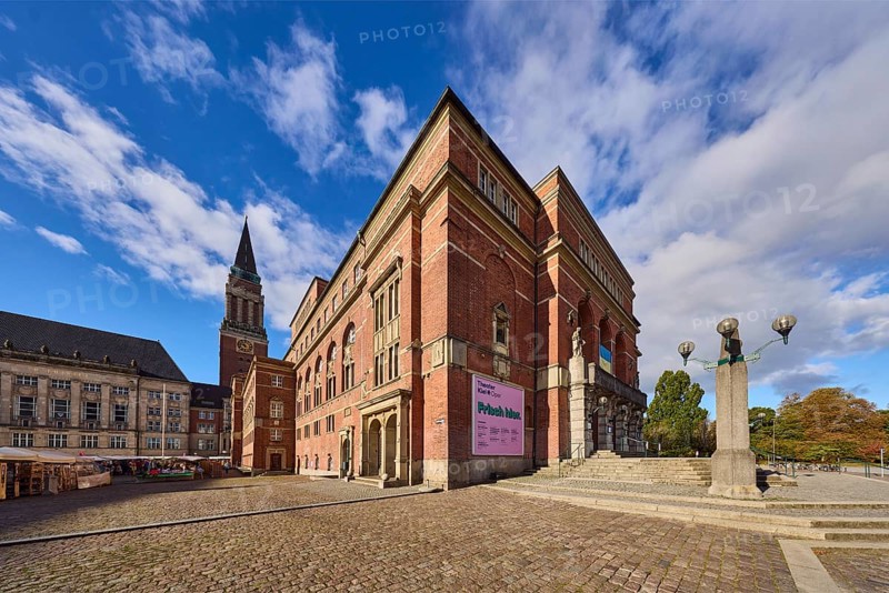 Opera house, architect Christian Heinrich Seeling, art nouveau style, brick building, brick architecture, building material brick and sandstone, staircase, lantern, general development, town hall tower, cobblestone square, trees, blue sky, cumulus clouds, town hall square, Kiel, state capital, district-free city, Schleswig-Holstein, Germany