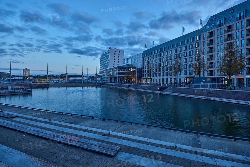 Boat harbor, water area, general architecture, commercial building, modern architecture, hotel, Accor Group, Adagio Access, ibis Styles, casino, Schwedenkai ferry terminal, evening blue hour, blue evening sky, cumulus clouds, Wall, Holstenbrücke and Kaistraße streets, Kiel, state capital, district-free city, Schleswig-Holstein, Germany