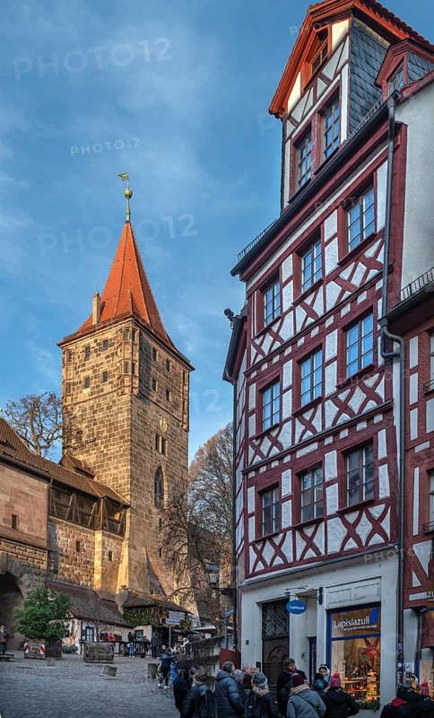 Medieval Tiergärtnertorturm, on the right a historic half-timbered residential building, Tiergärtnertor, Nuremberg, Middle Franconia, Bavaria, Germany