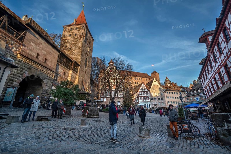Medieval Tiergärtnertorturm, historic half-timbered houses and Kaiserburg, Tiergärtnertor in the evening light, Nuremberg, Middle Franconia, Bavaria, Germany