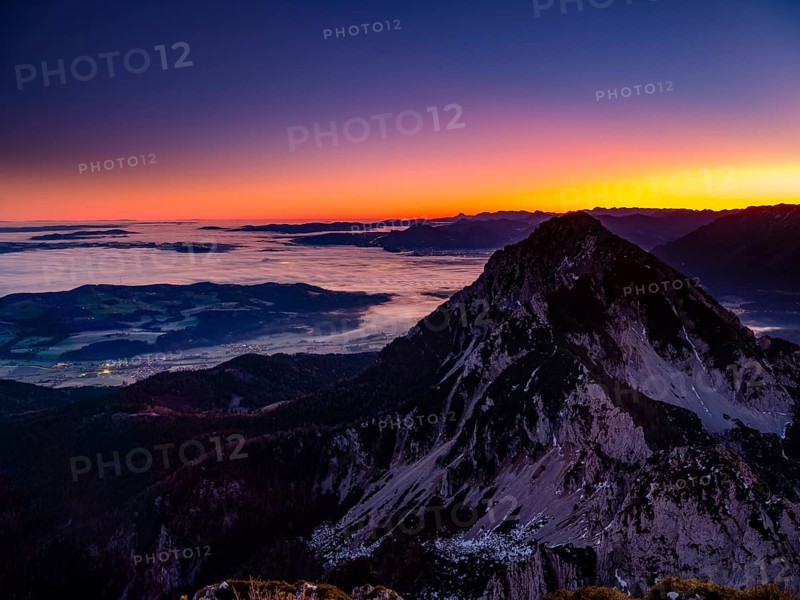 Dawn in the mountains, view of Salzburg with fog, Hochstaufen, Zwiesel, Bad Reichenhall, Berchtesgadener Land, Upper Bavaria, Bavaria, Germany