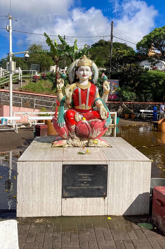 Statue sculpture of Hindu deity goddess Mahalaxmi of Hindu religion Hinduism, Eswarnath Shiv Jyotir Lingam temple, crater lake Sacred Lake Ganga Talao, Le Pétrin, Grand Bassin, Mauritius