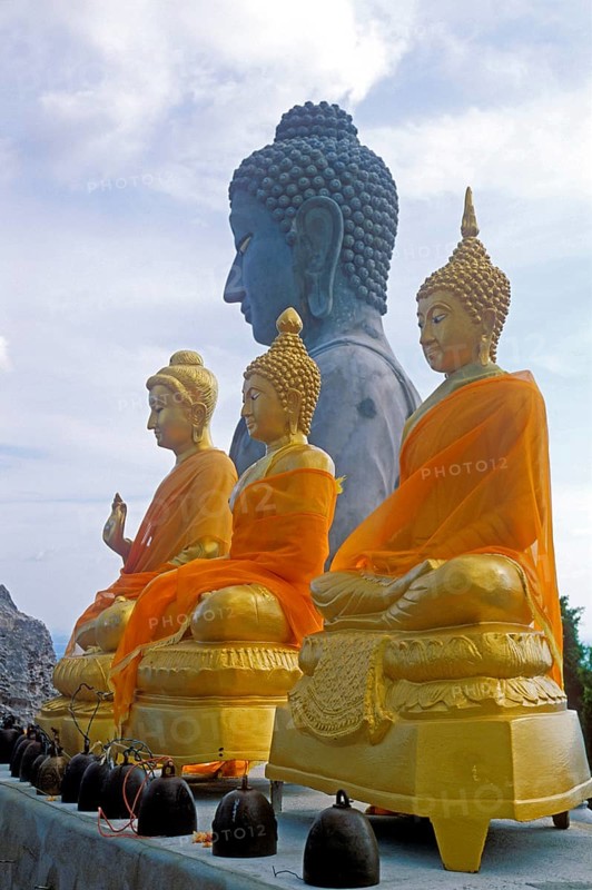 Buddha statues in the Wat Tam Sua monastery, which is partly on the top of a mountain, Krabi, Thailand, December 2002, vintage, retro, old, historic