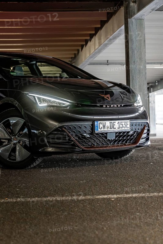 A modern car in a parking garage with dim lighting, Cupra electric car, e-car sharing, Calw, Germany