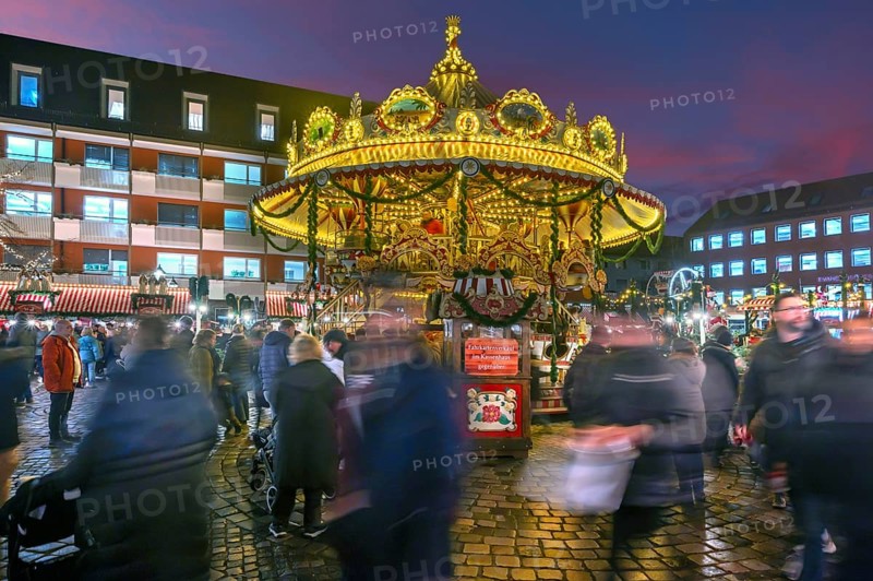 Nostalgic children's carousel at the children's Christmas market in the evening, Hans-Sachs-Platz, Nuremberg, Middle Franconia, Bavaria, Germany