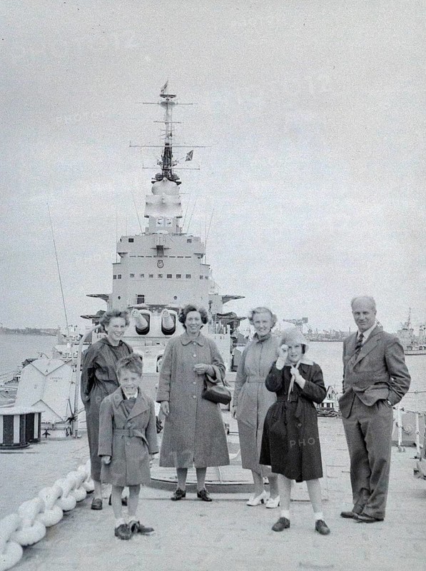 Family group of people on Royal Navy HMS Vanguard battleship, Devonport, Plymouth, Devon, England, UK c 1956