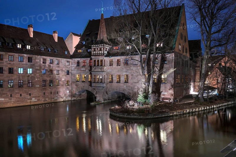 Former Heilig Geist Hospital above Pegnitz, built in the 14th century, now a rest of the restaurant, Nuremberg, Middle Franconia, Bavaria, Germany